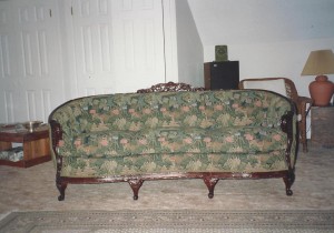 vintage couch with green floral fabric